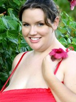 beautiful big sophie posing near flowers