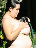 big chubby girl get hosed off